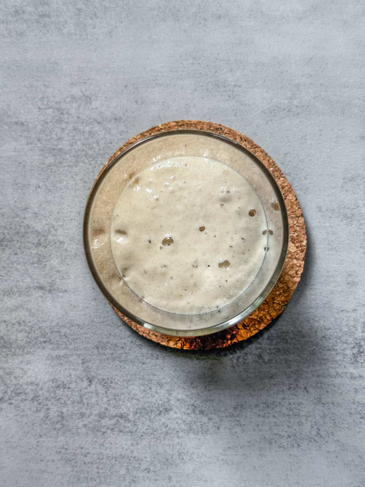Jar of sourdough starter on day 5 morning, overhead view.