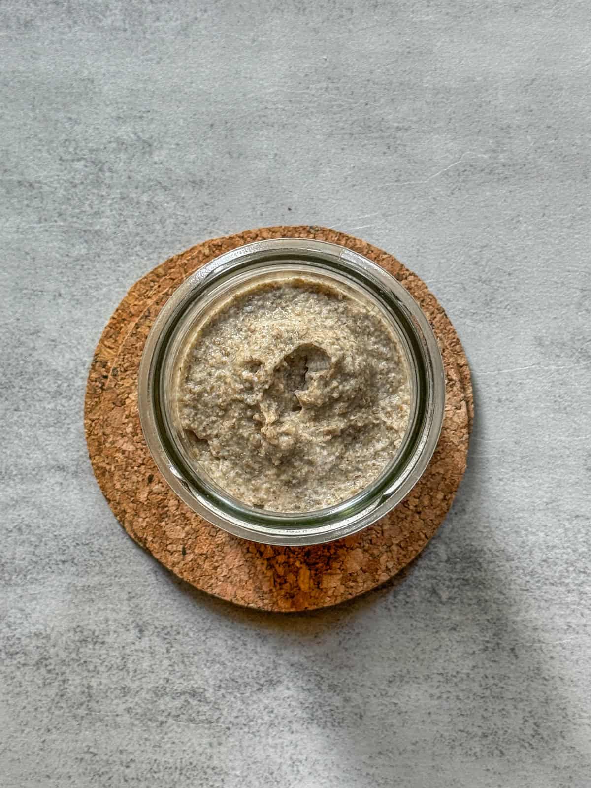 Mixed ingredients in a jar (overhead view).