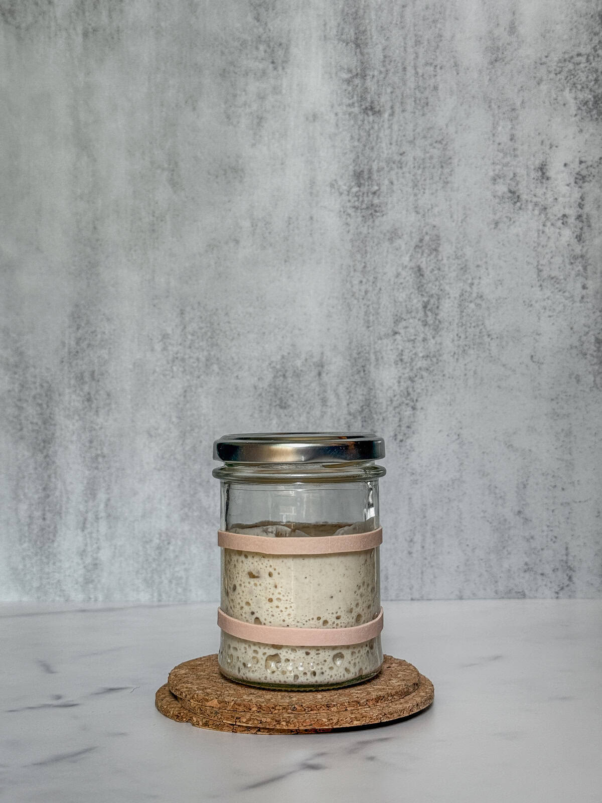 Starter progress in a jar since the morning of day five.