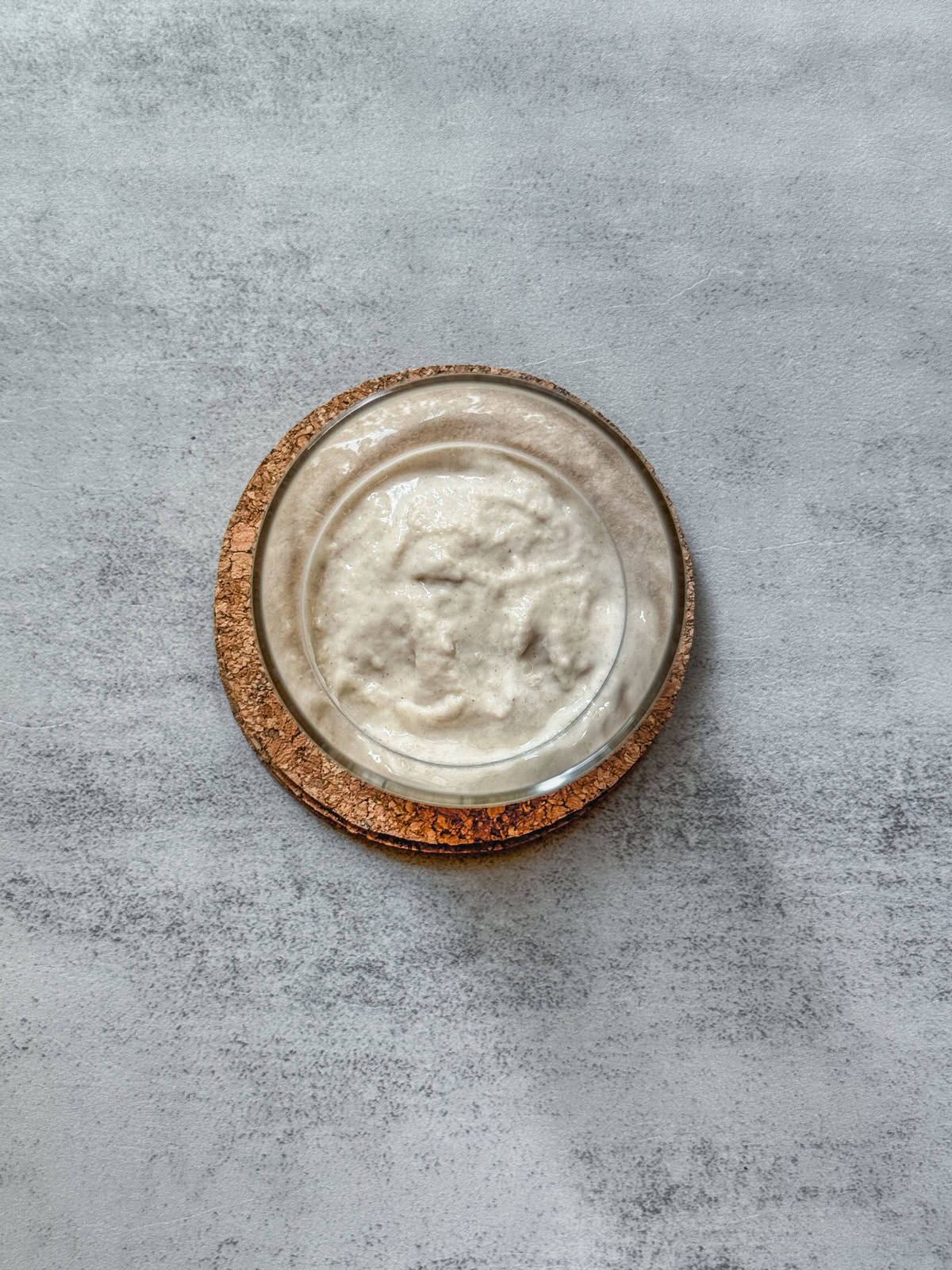 Jar of sourdough starter on day 2 morning, overhead view.