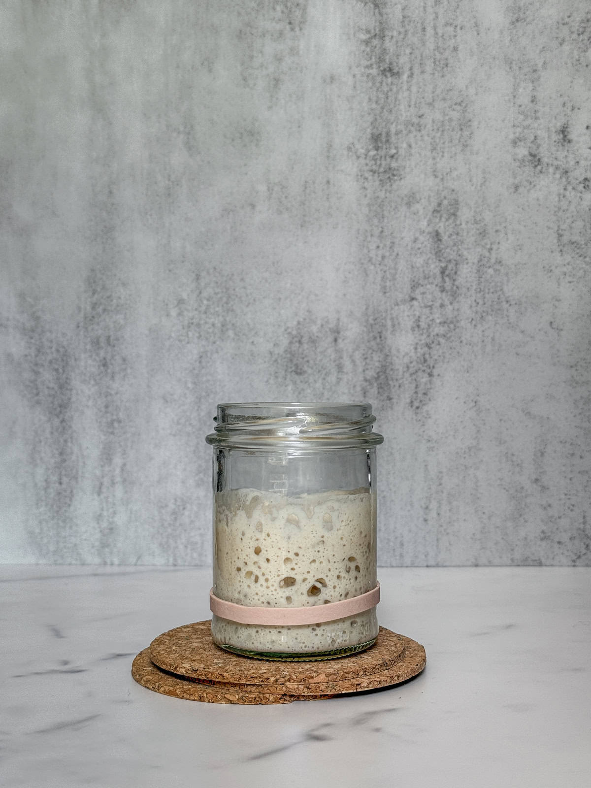 Hungry sourdough starter in a jar.