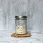 Rehydrated sourdough starter in a jar.