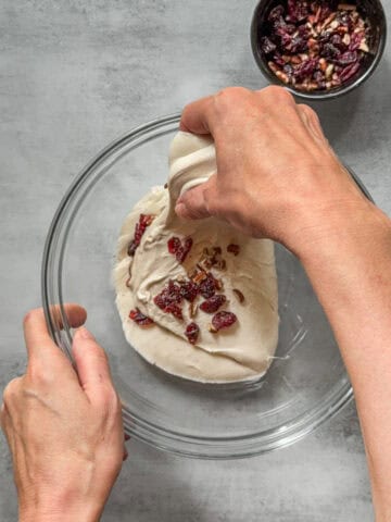 Adding inclusions to sourdough during stretch and folds.